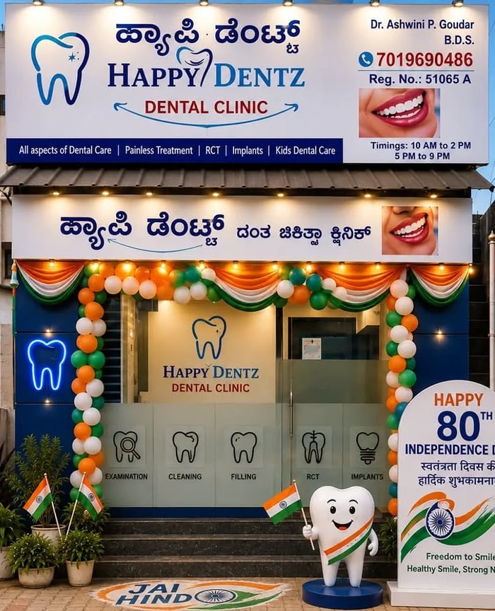 The Happy Dentz clinic front on Anand Nagar Road, with its blue tooth sign and frosted glass door