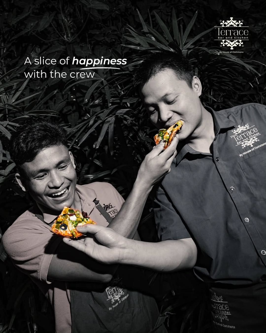 Two of the Terrace crew sharing a slice