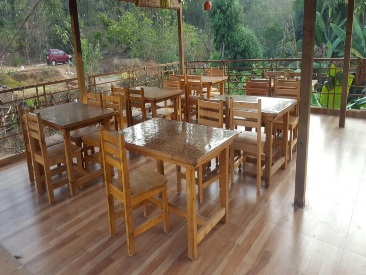 Wooden tables in the open dining hall