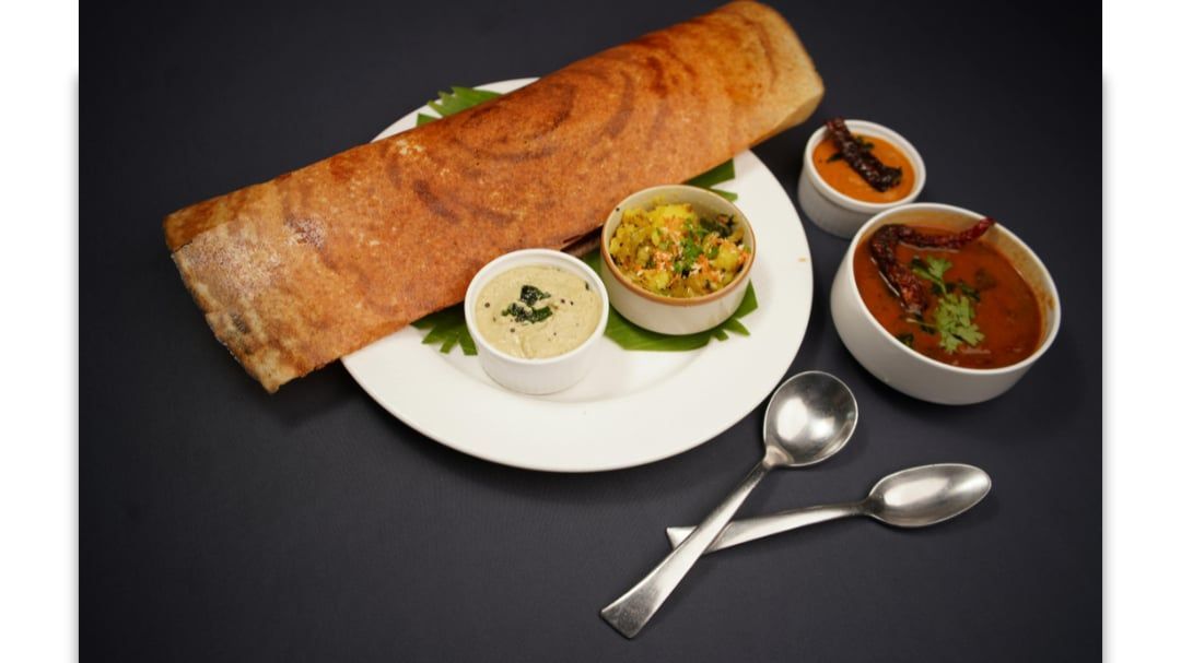 Masala dosa with sambar and chutneys