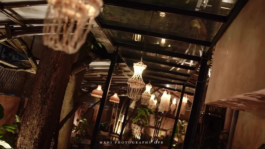 The Bamboo Oasis sign, by night