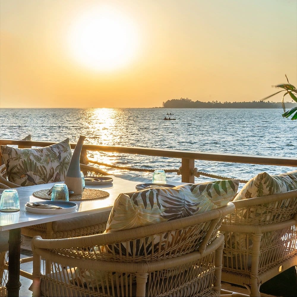 Lounge chairs on the deck at sunset