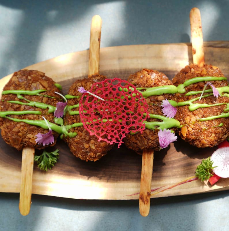 Kebab skewers dressed with herbs