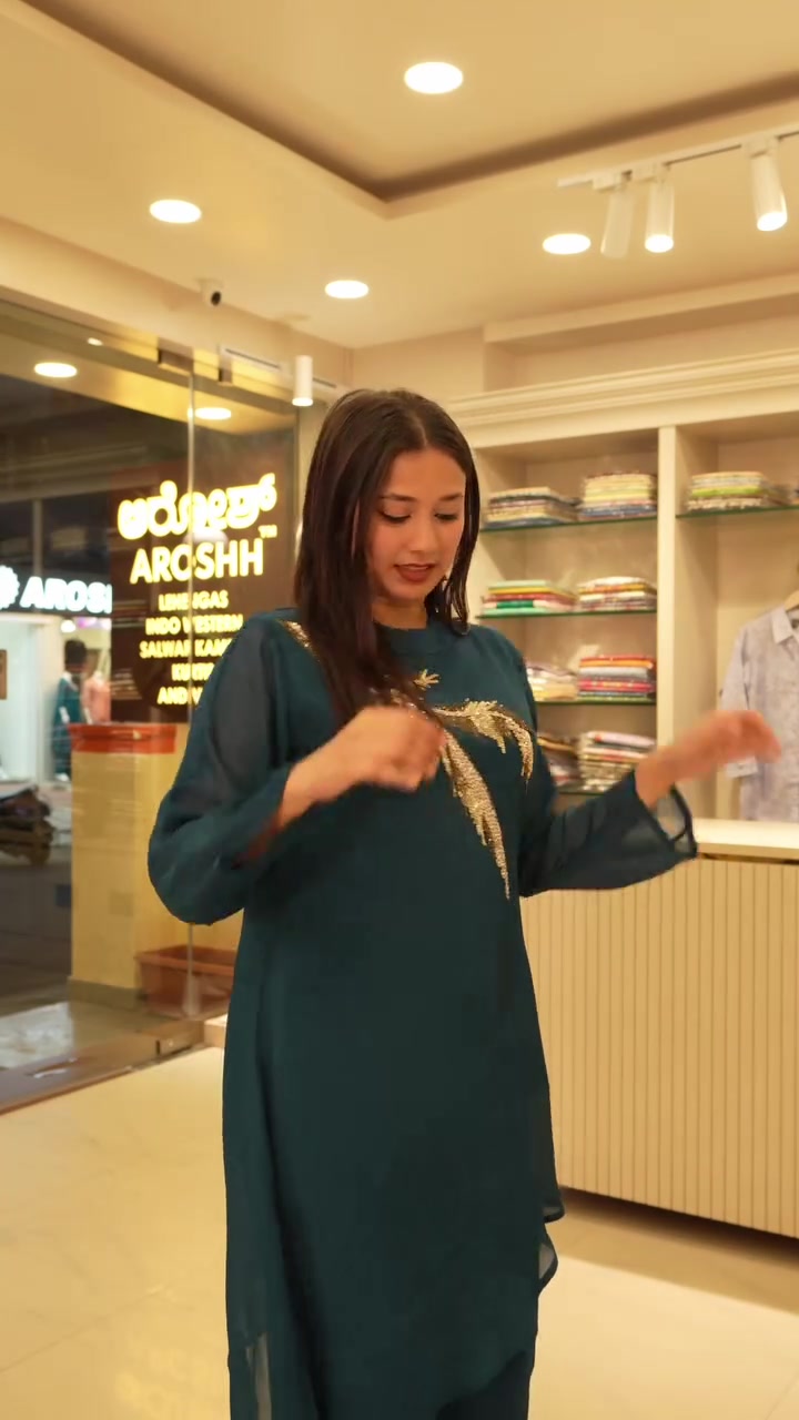Teal kurta with a gold sequin motif